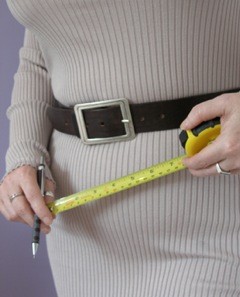 Woman with tape measure