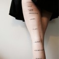 Woman with writing on her legs